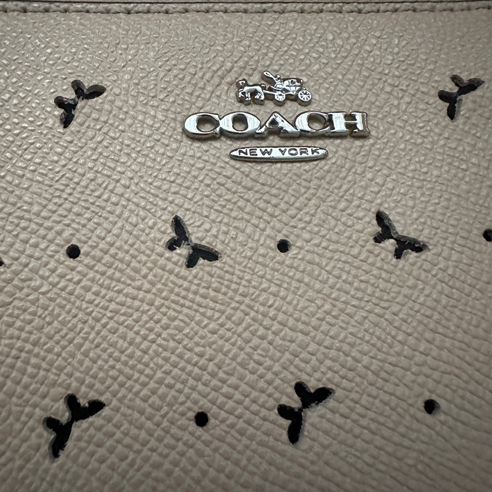 Coach Beige Wristlet with Butterfly Cutouts - Picture 2 of 9